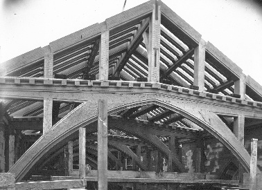The roof frame in place above the church, still to be planked with solid oak boards and sheathed in monel.