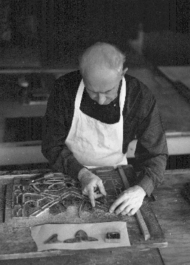 Here the glass, after details have been painted and fired upon its colors, is fitted into a panel with a simple leading instrument.